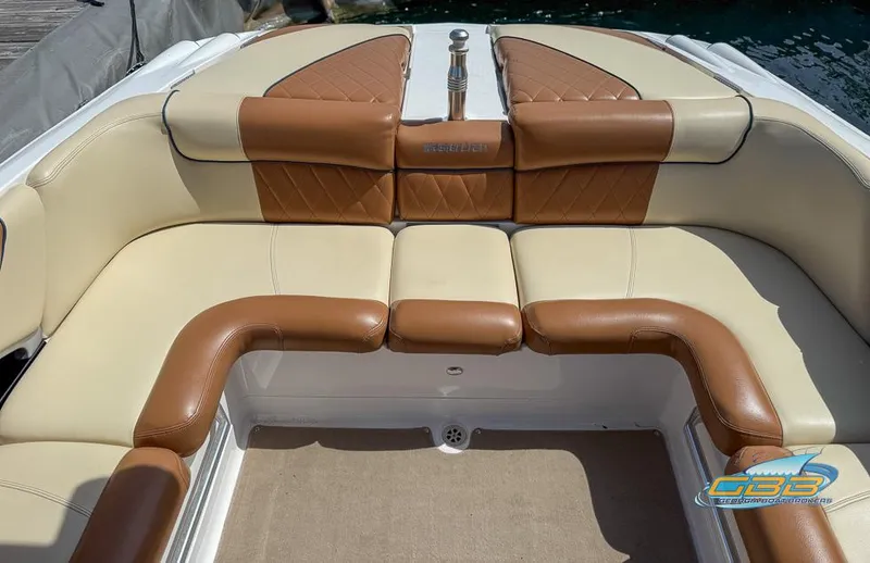 Slide: The Image of 2013 MasterCraft X-45 boat interior with tan and brown leather seating. - 8