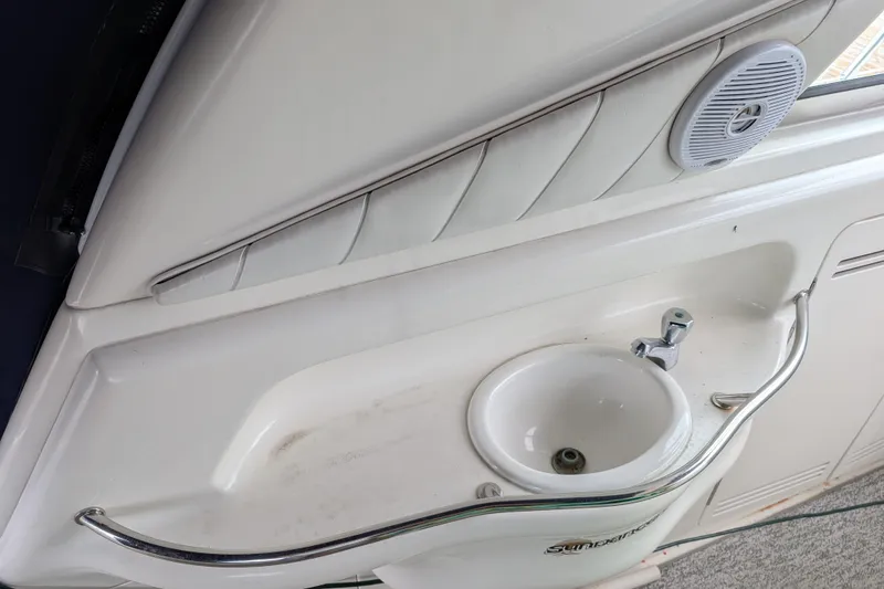 Slide: The Image of Interior sink area of a 1998 Sea Ray 400 Sundancer yacht. - 13