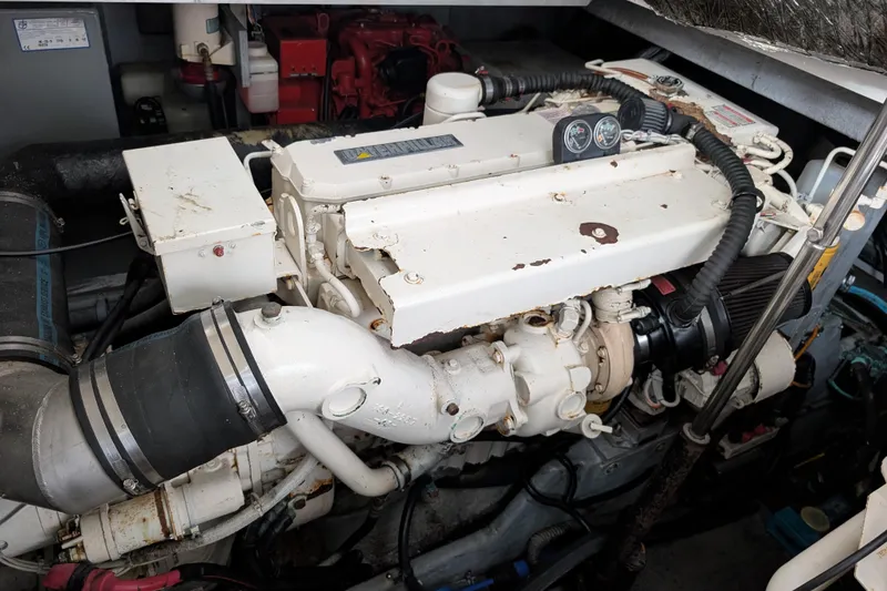 Slide: The Image of Engine compartment of a 1998 Sea Ray 400 Sundancer boat. - 16
