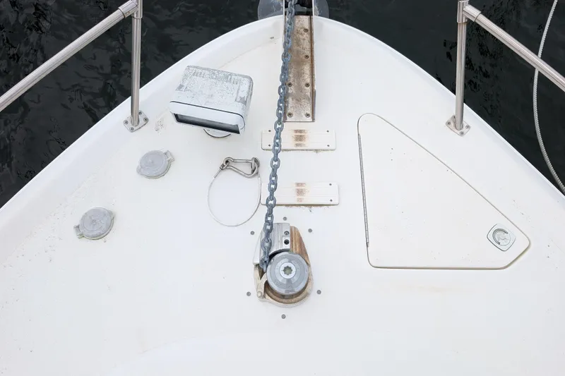 Slide: The Image of Bow of 1998 Sea Ray 400 Sundancer with anchor chain and deck fittings. - 6