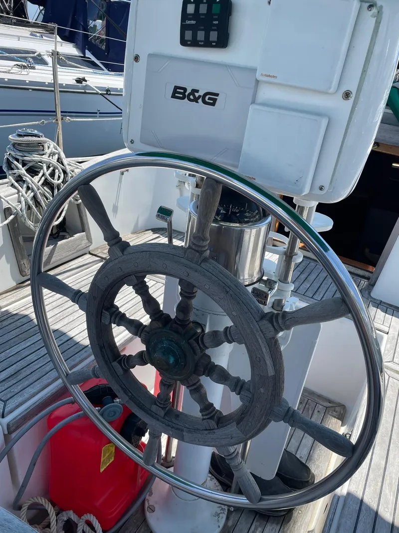 Slide: The Image of Steering wheel of a 1986 Cabo Rico CB38 sailboat with B&G navigation system. - 3
