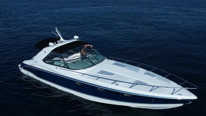 Slide: The Image of 2006 Formula 400 Super Sport boat cruising on open water. - 44