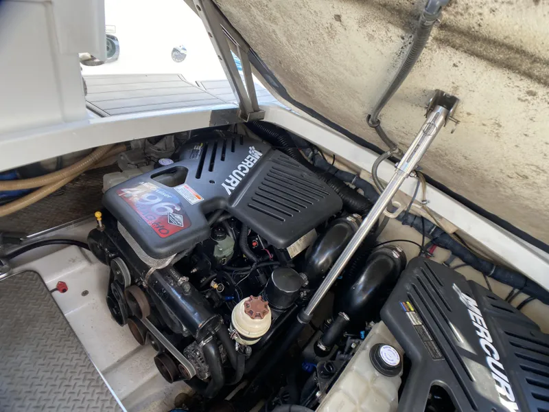 Slide: The Image of Engine compartment of a 2006 Formula 400 Super Sport boat with Mercury engines. - 48