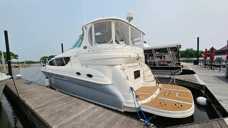 The Image of 2007 Sea Ray 40 Motor Yacht docked at marina, rear view. - 1