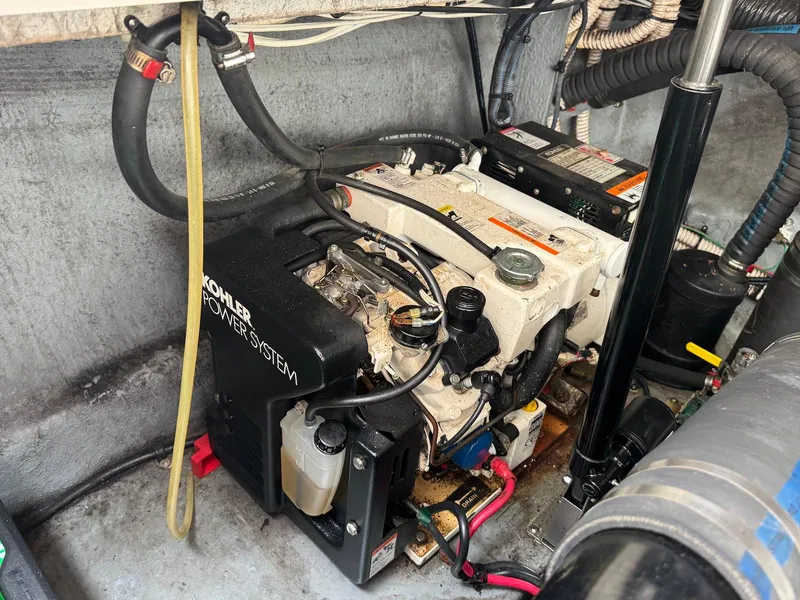 Slide: The Image of Engine compartment of a 2003 Sea Ray 340 Sundancer with Kohler power system. - 28
