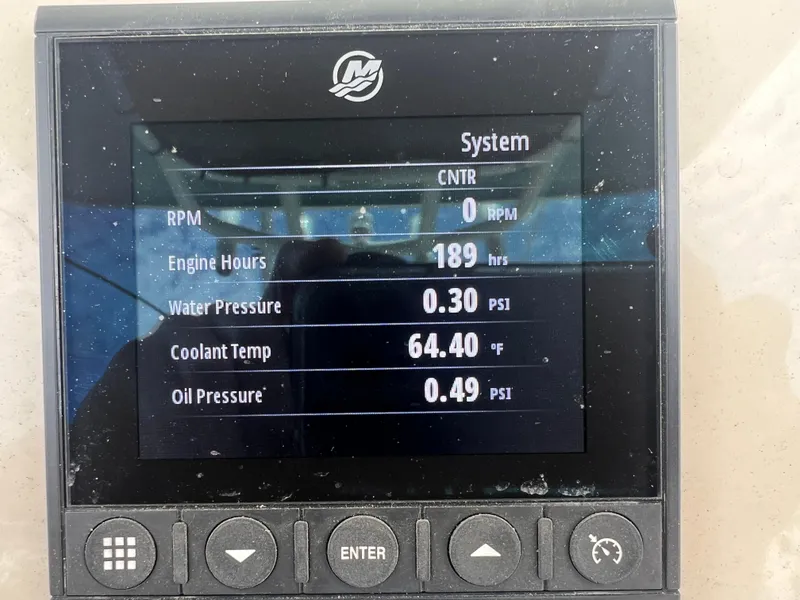 Slide: The Image of Display panel of 2022 Boston Whaler 220 Dauntless showing engine metrics. - 24