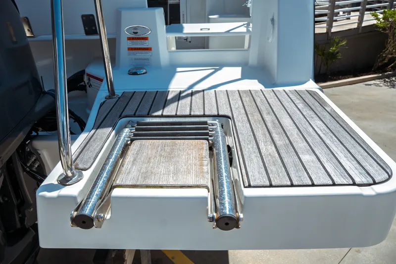 Slide: The Image of 2023 Jeanneau NC Weekender 795 Series 2 swim platform with ladder and wood finish. - 21