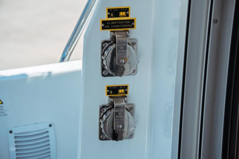 Slide: The Image of 2023 Jeanneau NC Weekender 795 Series 2 air conditioning power outlets. - 34