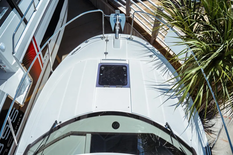 Slide: The Image of 2023 Jeanneau NC Weekender 795 Series 2 boat deck with hatch and railing. - 5