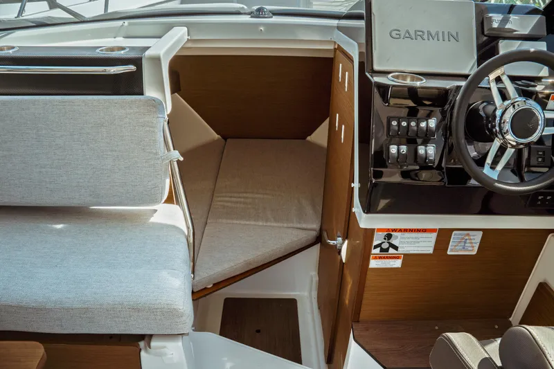 Slide: The Image of 2023 Jeanneau NC Weekender 795 Series 2 interior with Garmin navigation system. - 55