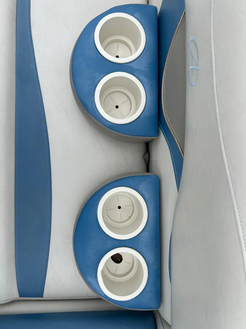 Slide: The Image of Blue and white boat seating with cup holders, Avalon Windjammer 2007 model. - 24