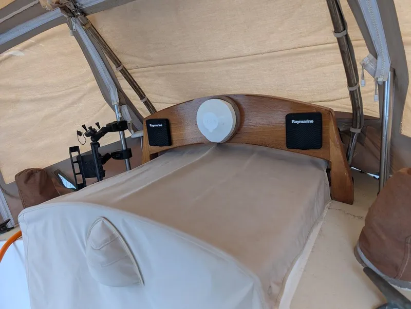 Slide: The Image of 1977 Alajuela 38 Mk1 cockpit with navigation equipment and protective cover. - 20