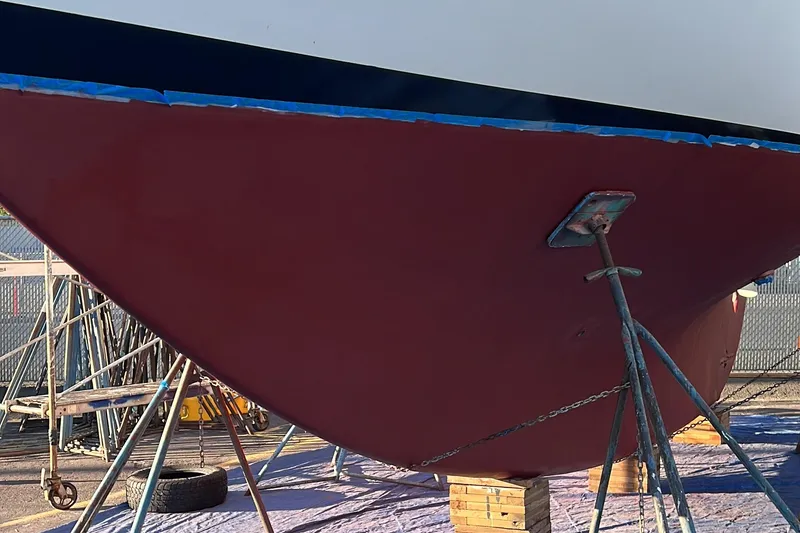 Slide: The Image of Alajuela 38 Mk1 sailboat hull, 1977 model, on stands for maintenance. - 34