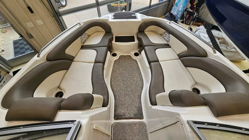 Slide: The Image of 2011 Yamaha Boats 242 Limited S interior with spacious seating and modern design. - 14