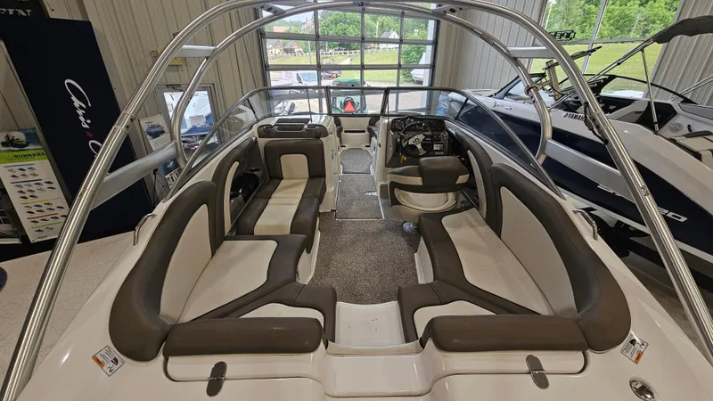 Slide: The Image of 2011 Yamaha Boats 242 Limited S interior with spacious seating and sleek design. - 6