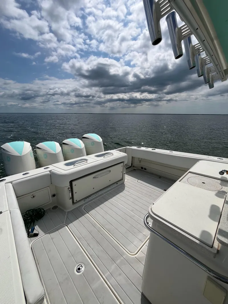 Slide: The Image of 2019 HCB Siesta boat deck with ocean view and cloudy sky. - 13
