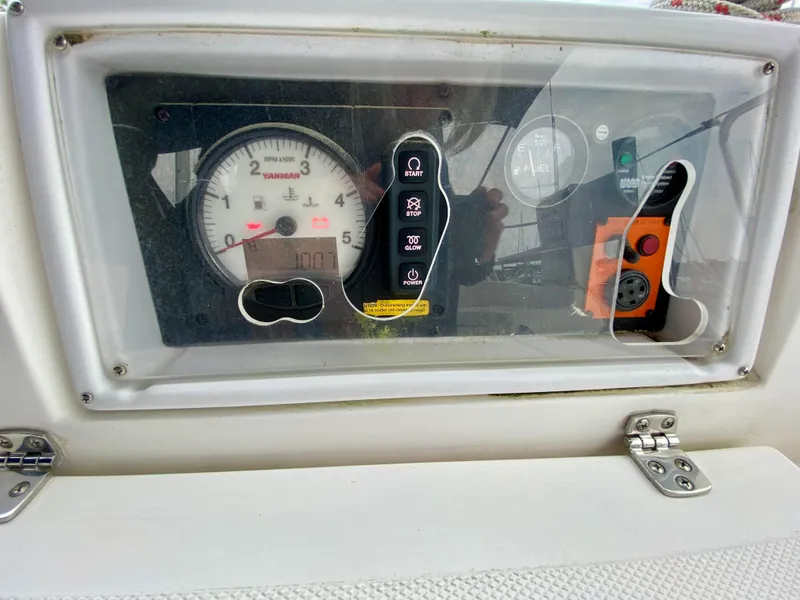 Slide: The Image of Control panel of a 2008 Hunter 36-2 sailboat with gauges and switches. - 11