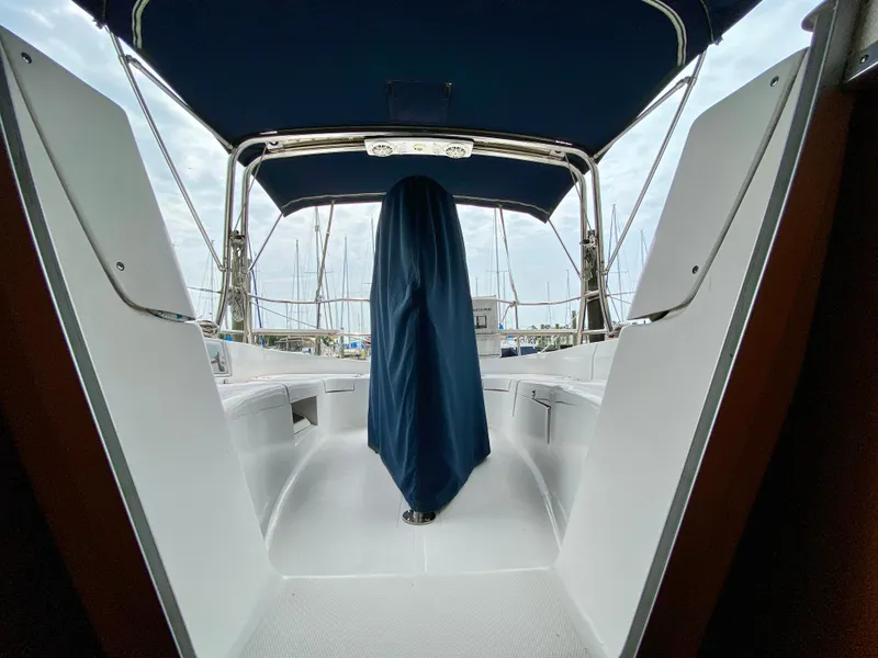 Slide: The Image of Sailboat cockpit with blue canopy, Hunter 36-2, 2008 model, marina background. - 13