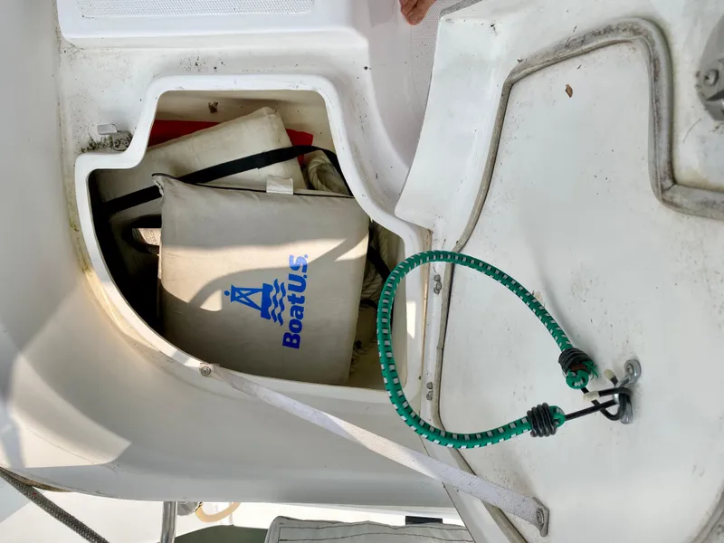 Slide: The Image of Storage compartment on a 2008 Hunter 36-2 sailboat with boating gear and accessories. - 23