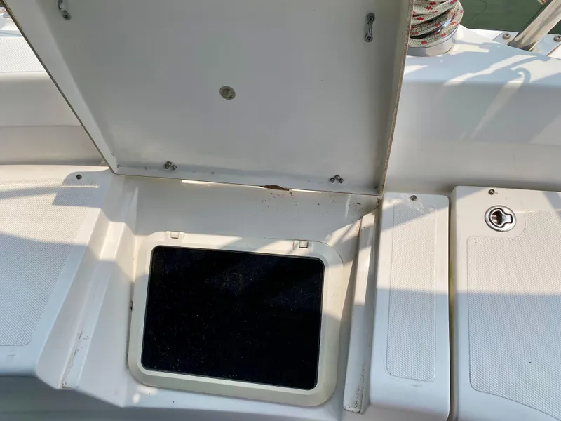 Slide: The Image of Open hatch on 2008 Hunter 36-2 boat deck, showing storage compartment. - 24