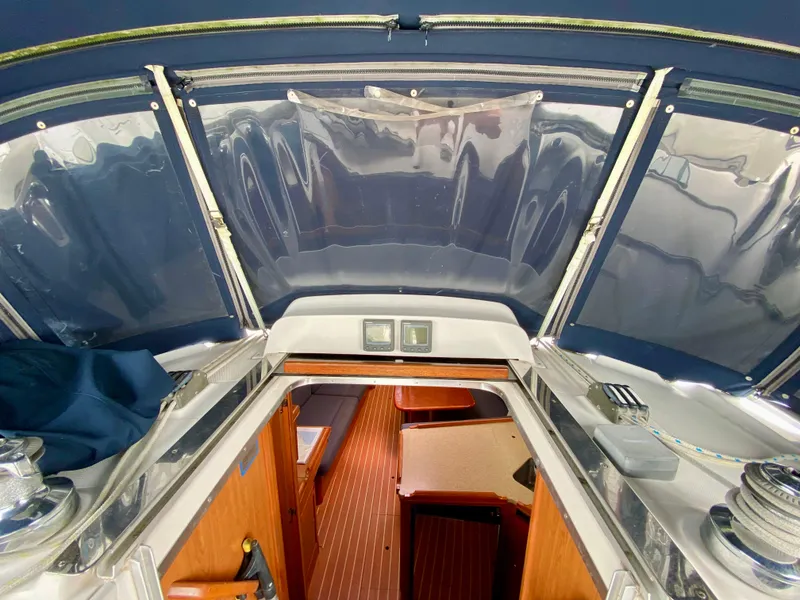 Slide: The Image of Interior view of a 2008 Hunter 36-2 sailboat, featuring a cabin entrance. - 29