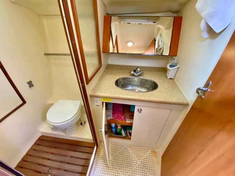 Slide: The Image of Compact bathroom in 2008 Hunter 36-2 yacht with sink, toilet, and storage. - 47