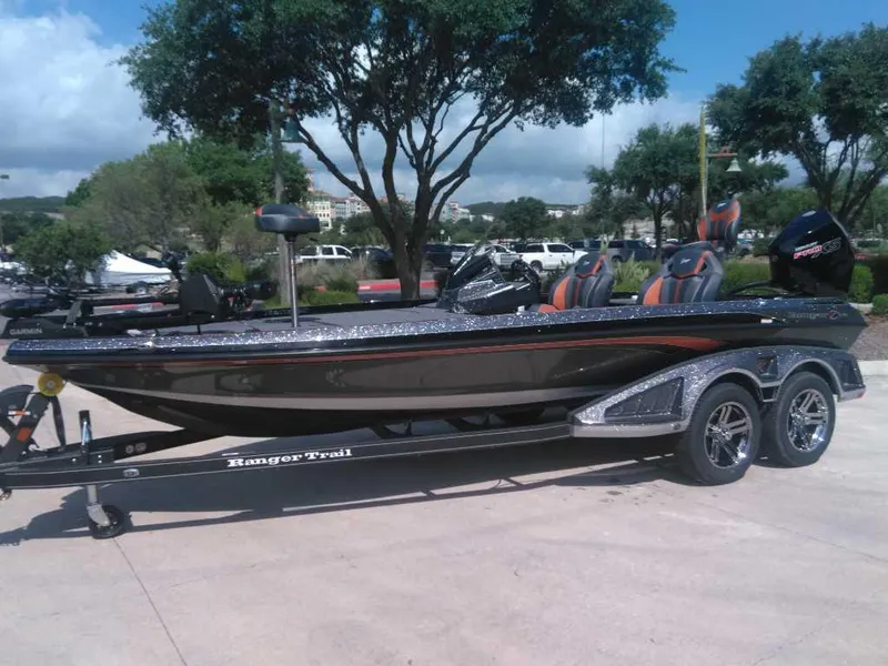 The Image of 2025 Ranger Z520R Cup-Equipped boat on trailer, parked outdoors. - 0