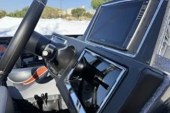 Slide: The Image of 2025 Ranger Z520R Cup-Equipped dashboard with modern controls and displays. - 10