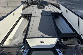 Slide: The Image of 2025 Ranger Z520R Cup-Equipped boat interior with open storage compartments. - 11