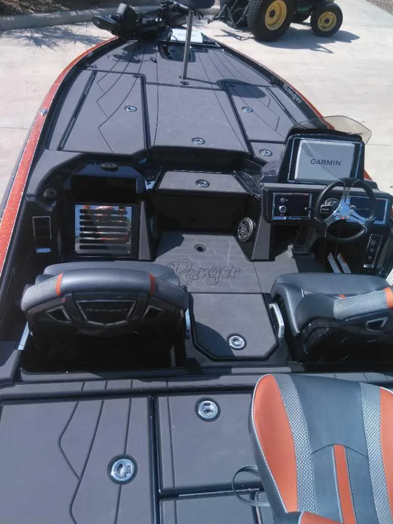Slide: The Image of 2025 Ranger Z520R Cup-Equipped boat interior with Garmin system and sleek seating. - 4