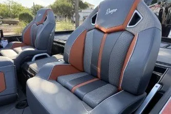 Slide: The Image of 2025 Ranger Z520R Cup-Equipped boat seats with stylish gray and orange design. - 8