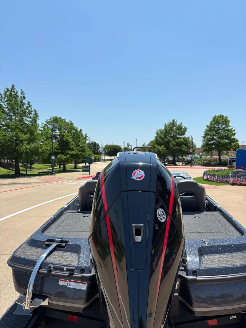 Slide: The Image of 2025 Nitro Z21 XL boat interior with steering wheel and control panel. - 3
