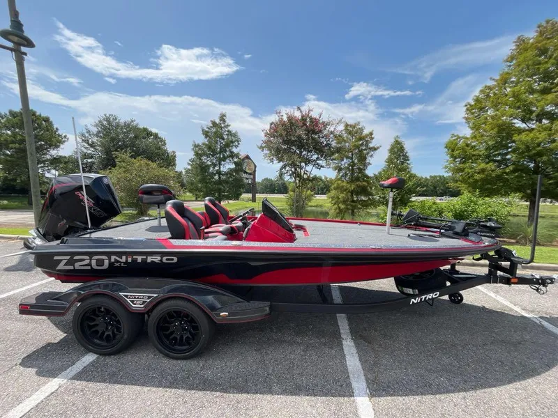 The Image of 2025 Nitro Z20 XL Pro boat parked outdoors on a sunny day. - 0