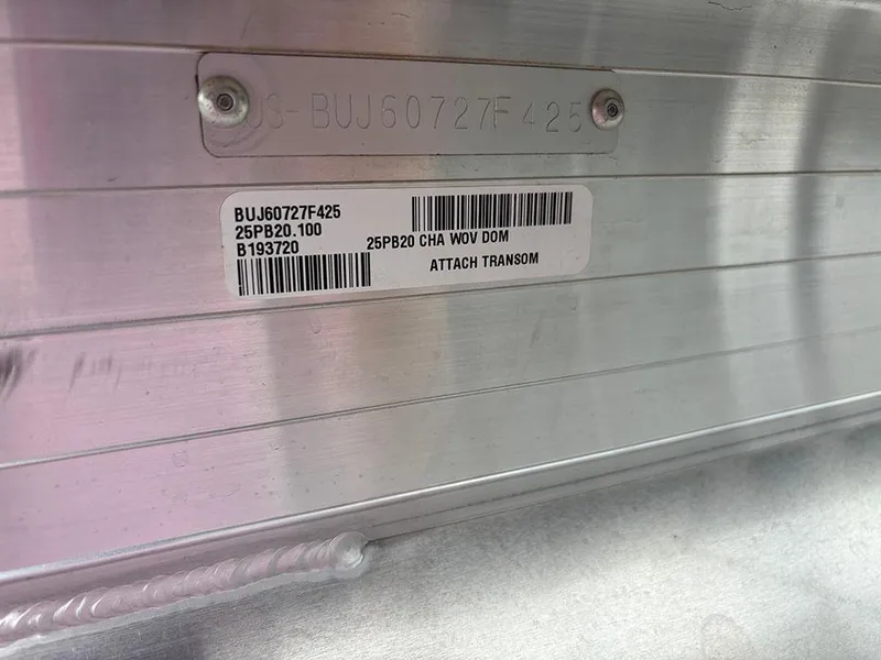 Slide: The Image of 2025 Sun Tracker Party Barge 20 DLX identification plate with serial and model numbers. - 25