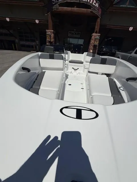 Slide: The Image of 2025 Tahoe T16 boat interior with white seating and sleek design. - 6