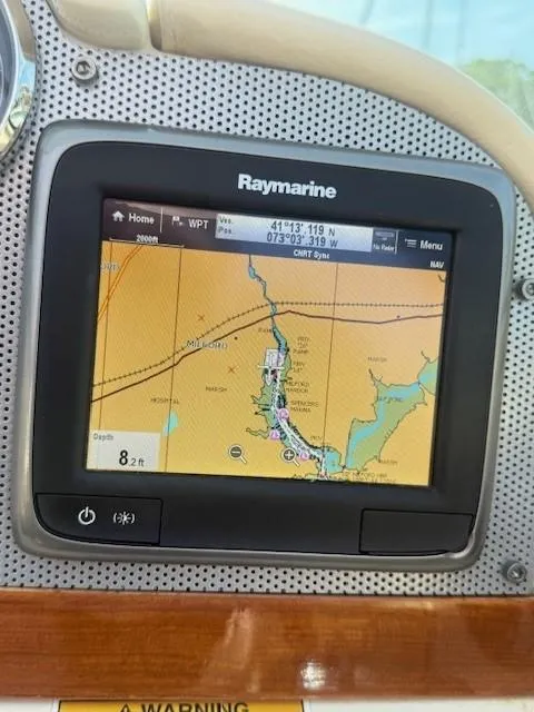Slide: The Image of Raymarine GPS display on 2014 Chris-Craft Launch 25 boat, showing navigational map. - 18