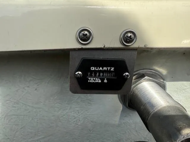 Slide: The Image of Hour meter on 2014 Chris-Craft Launch 25 boat, displaying total engine hours. - 42