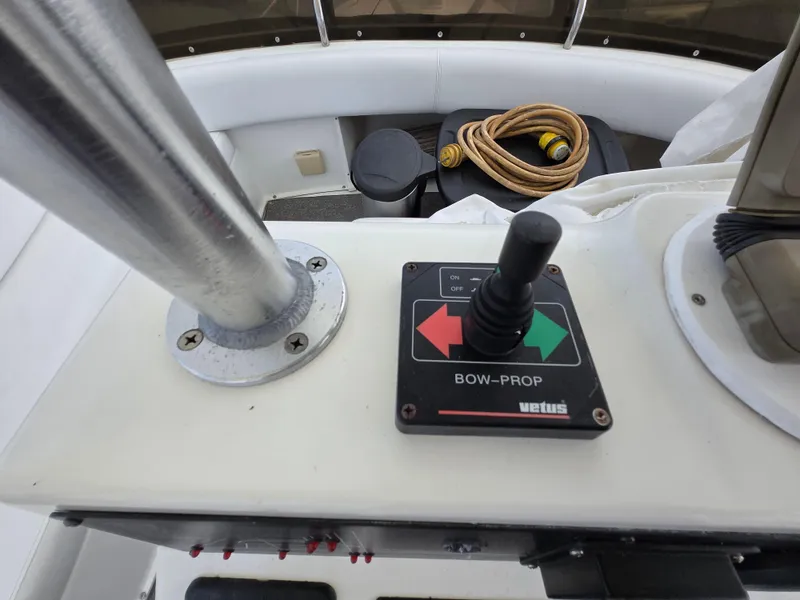 Slide: The Image of Control panel of a 1996 Silverton 37 Convertible boat with bow thruster joystick. - 35