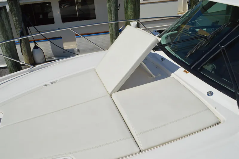 Slide: The Image of 2016 Tiara Yachts C44 Coupe with adjustable sunpad on deck. - 25