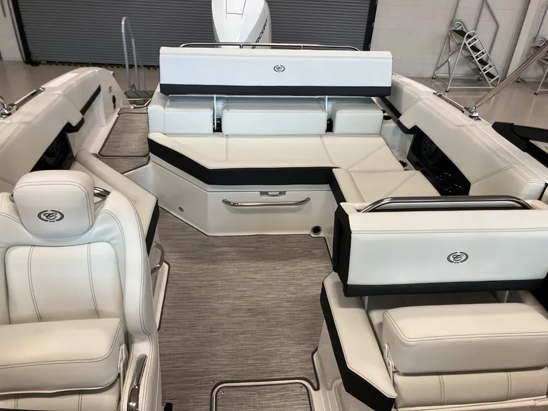 Slide: The Image of 2025 Cobalt R4 Outboard boat interior with luxurious white seating and modern design. - 11