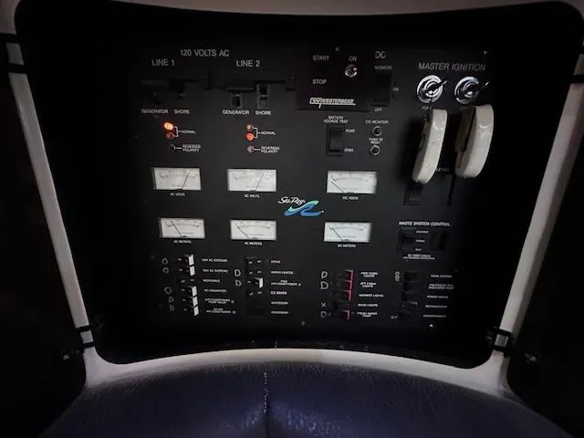 Slide: The Image of Control panel of a 1995 Sea Ray 400 Express Cruiser boat. - 25