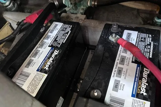 Slide: The Image of Duralast Gold batteries in a 1995 Sea Ray 400 Express Cruiser engine compartment. - 37