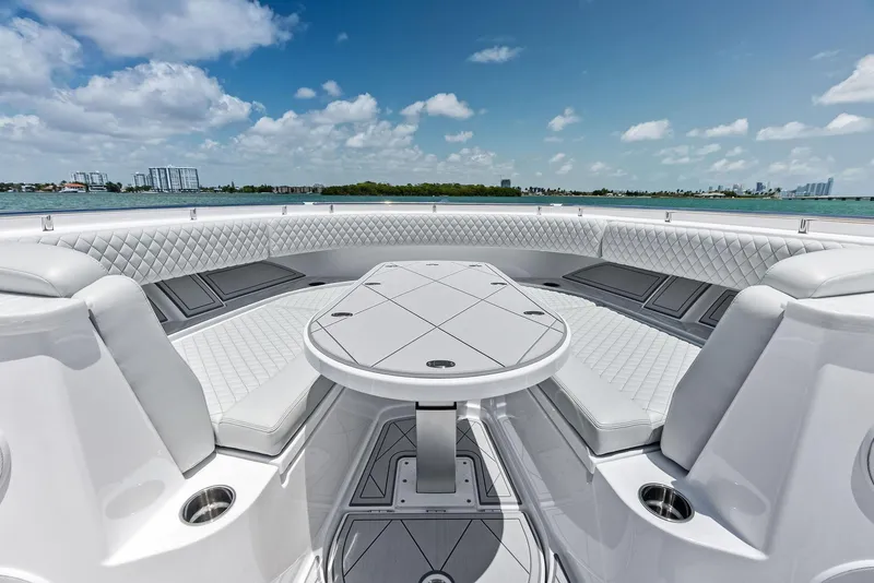 Slide: The Image of Luxurious seating area on 2025 HCB 56' Sueños GIX yacht with ocean view. - 23