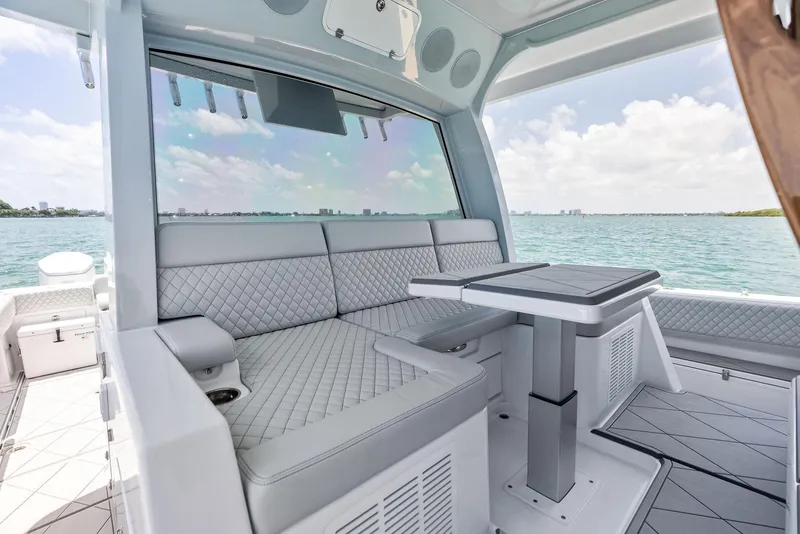 Slide: The Image of Luxurious seating area on 2025 HCB 56' Sueños GIX yacht with ocean view. - 26