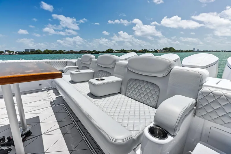 Slide: The Image of Luxurious seating on 2025 HCB 56' Sueños GIX yacht, featuring elegant white upholstery. - 28