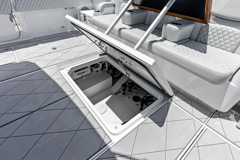 Slide: The Image of 2025 HCB 56' Sueños GIX yacht with open storage compartment on deck. - 34