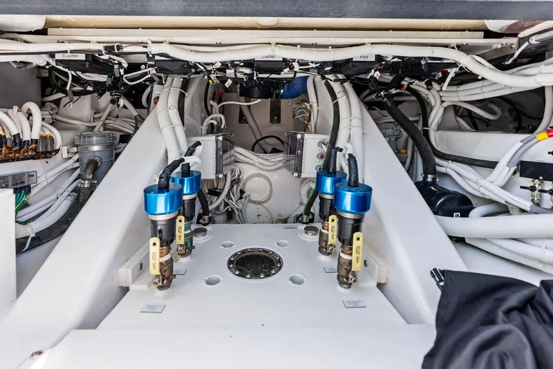 Slide: The Image of Engine room of 2025 HCB 56' Sueños GIX with complex wiring and components. - 42