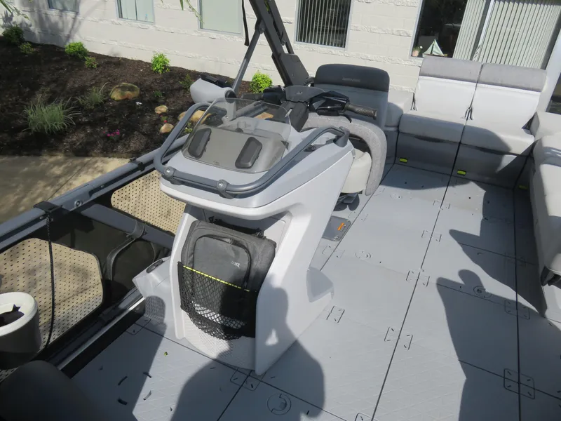 Slide: The Image of 2023 Sea-Doo Switch 230 interior with modern helm and spacious seating. - 5