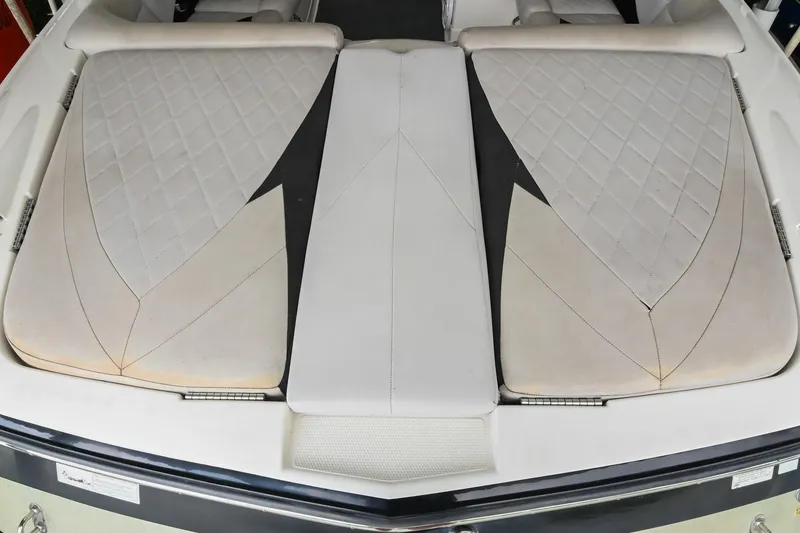 Slide: The Image of 2009 MasterCraft X-45 boat interior with diamond-stitched upholstery and sleek design. - 12