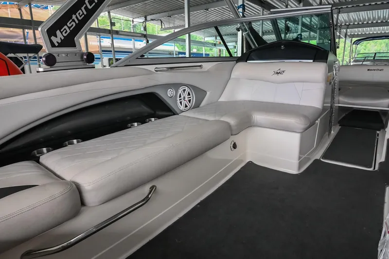 Slide: The Image of 2009 MasterCraft X-45 boat interior with white seating and sleek design. - 22